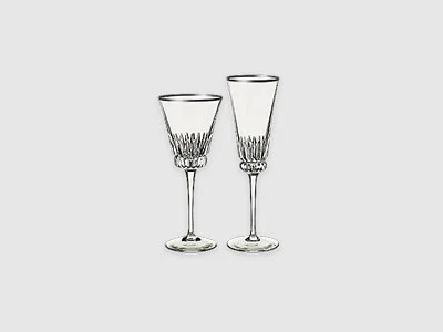Image de la collection - Grand Royal Deux verres à vin en cristal clair avec des motifs gravés dans les moitiés inférieures, placés côte à côte sur un fond sobre.
