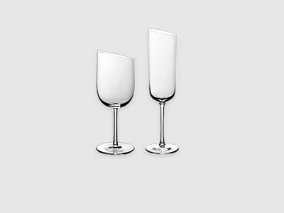 Image de la collection - Verres NewMoon Deux verres à pied en verre transparent, un verre à vin et une flûte à champagne, sont posés sur un fond gris clair sobre.