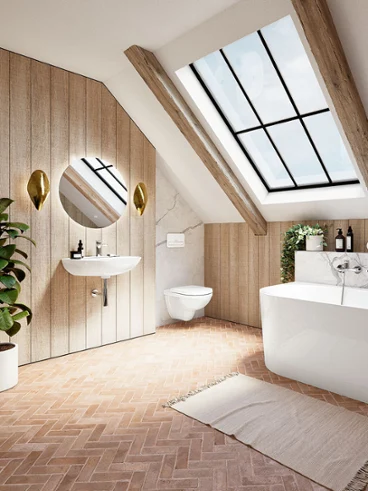 Une baignoire O.novo avec un lavabo et des toilettes. Une salle de bains moderne avec une baignoire, un lavabo mural, un miroir rond et des WC de la collection O.novo. Une grande lucarne et une plante en pot mettent la pièce en valeur. Des notes de bois et des carreaux à motif à chevrons donnent à la pièce une touche rustique.