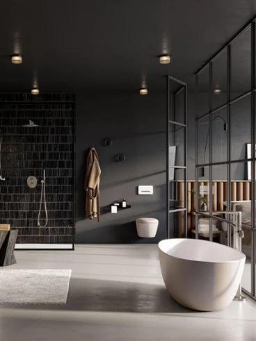 Une baignoire blanche Antao dans une salle de bains élégante Une salle de bains moderne avec des murs noirs et une baignoire Antao blanche de Villeroy & Boch.