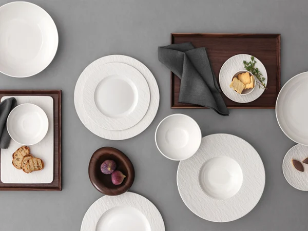 Manufacture ice collection picture Manufacture ice collection picture with some plate and bowls with bread on it stand on a grey background