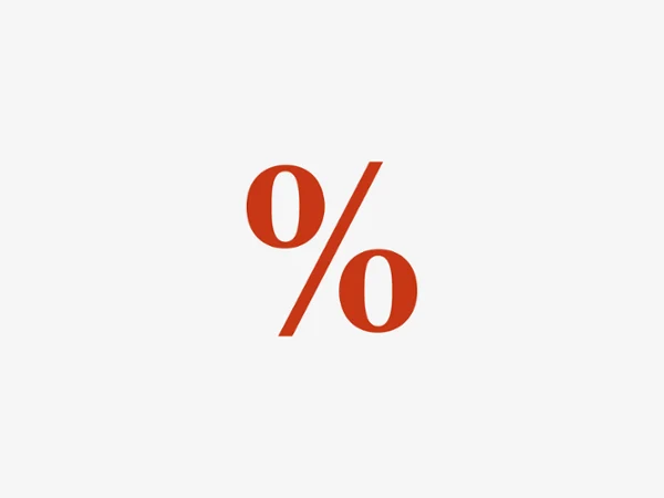 Un symbole de pourcentage rouge est centré sur un simple fond blanc.