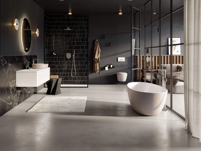 Une baignoire blanche Antao dans une salle de bains élégante Une salle de bains moderne avec des murs noirs et une baignoire Antao blanche de Villeroy & Boch.